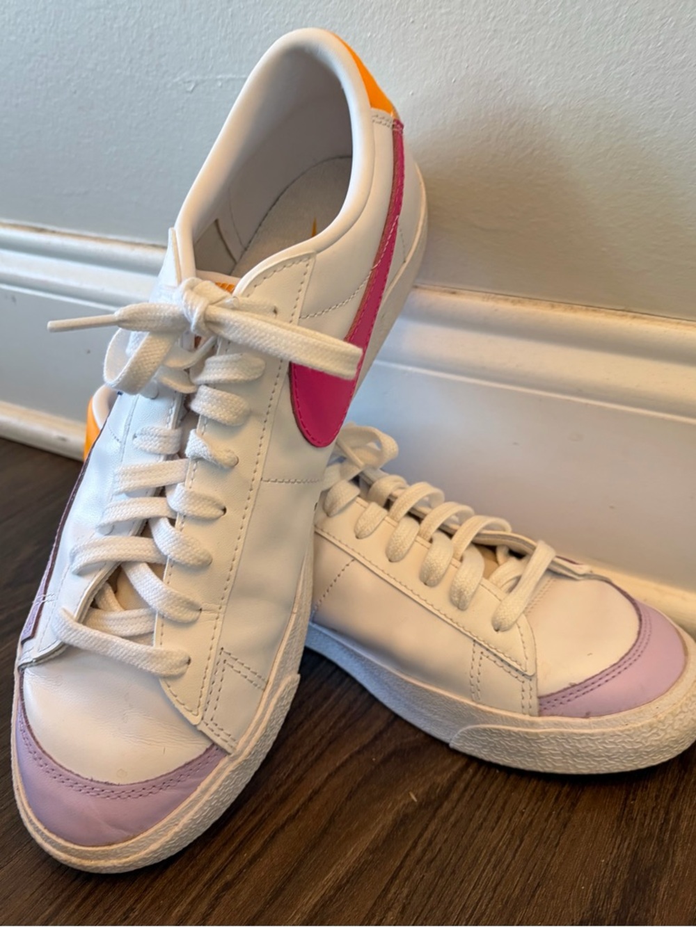 Nike Women’s White Leather Sneakers with Pink Swoosh and Lavender Toe Cap